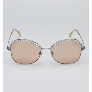 $670. Chanel Pearl top butterfly light weight sunnies. Light tan lenses. CC Logo